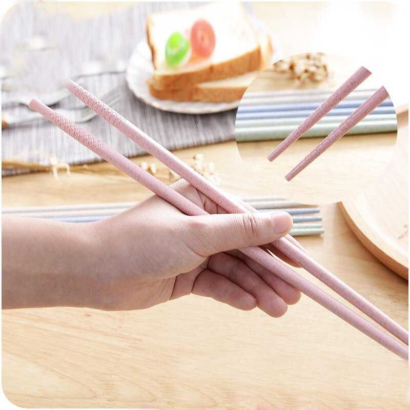 Как едят лапшу палочками. Хват палочек для суши. Лапша на палочках. Техника еды палочками для суши. Способы держания палочек для еды.